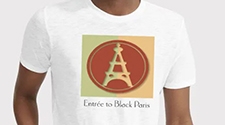 Monique Y. Wells, co-founder of Entrée to Black Paris, poses in Entrée to Black Paris T-shirt in the Luxembourg Garden